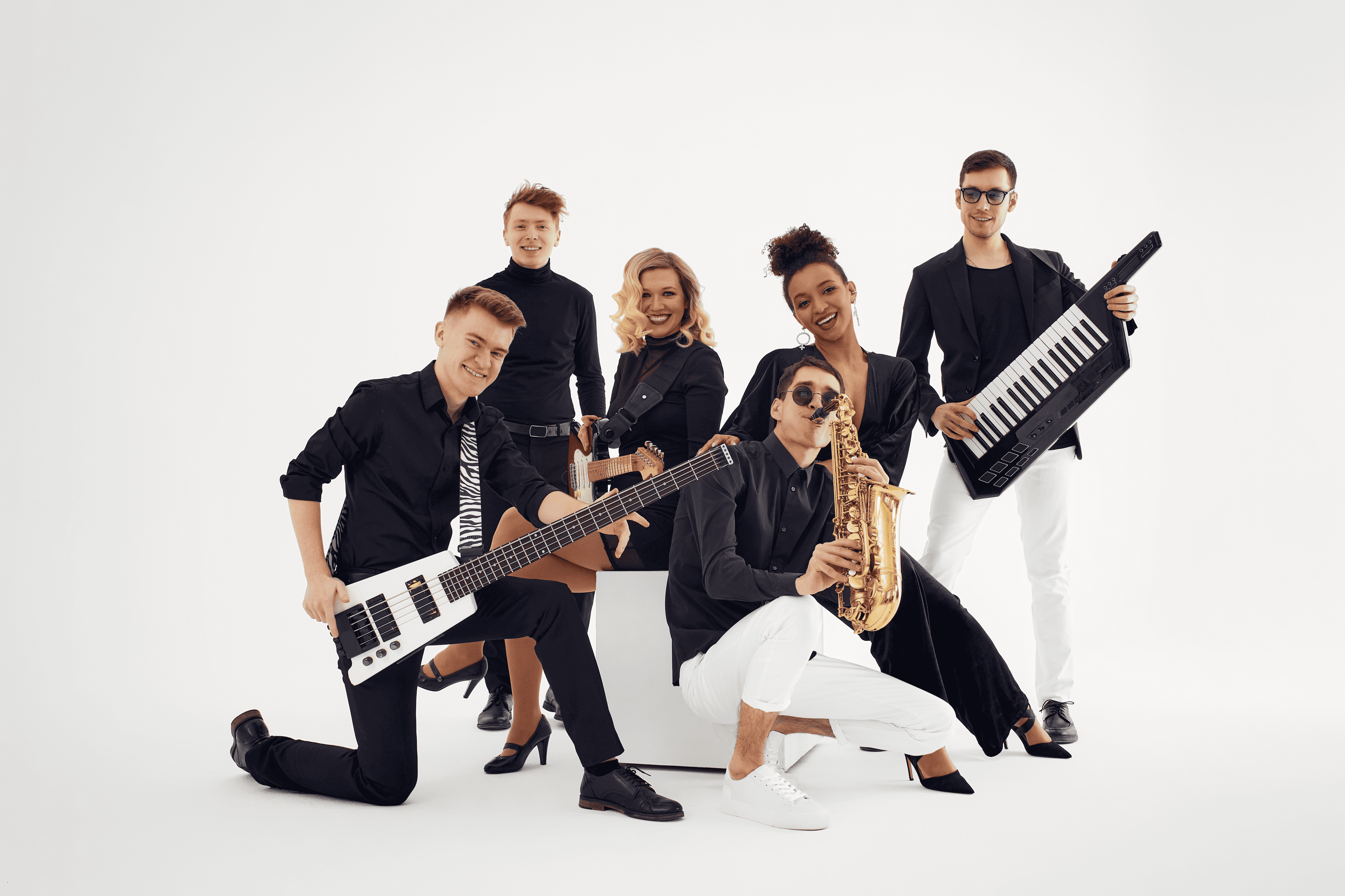 Professional musicians performing live at wedding event - PartyBands entertainment booking